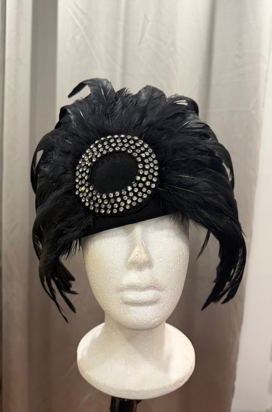 Black Feathered Hat with Decorative Elements