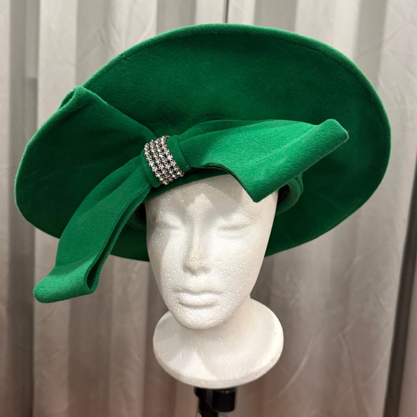 Green Hat with a Decorative Bow
