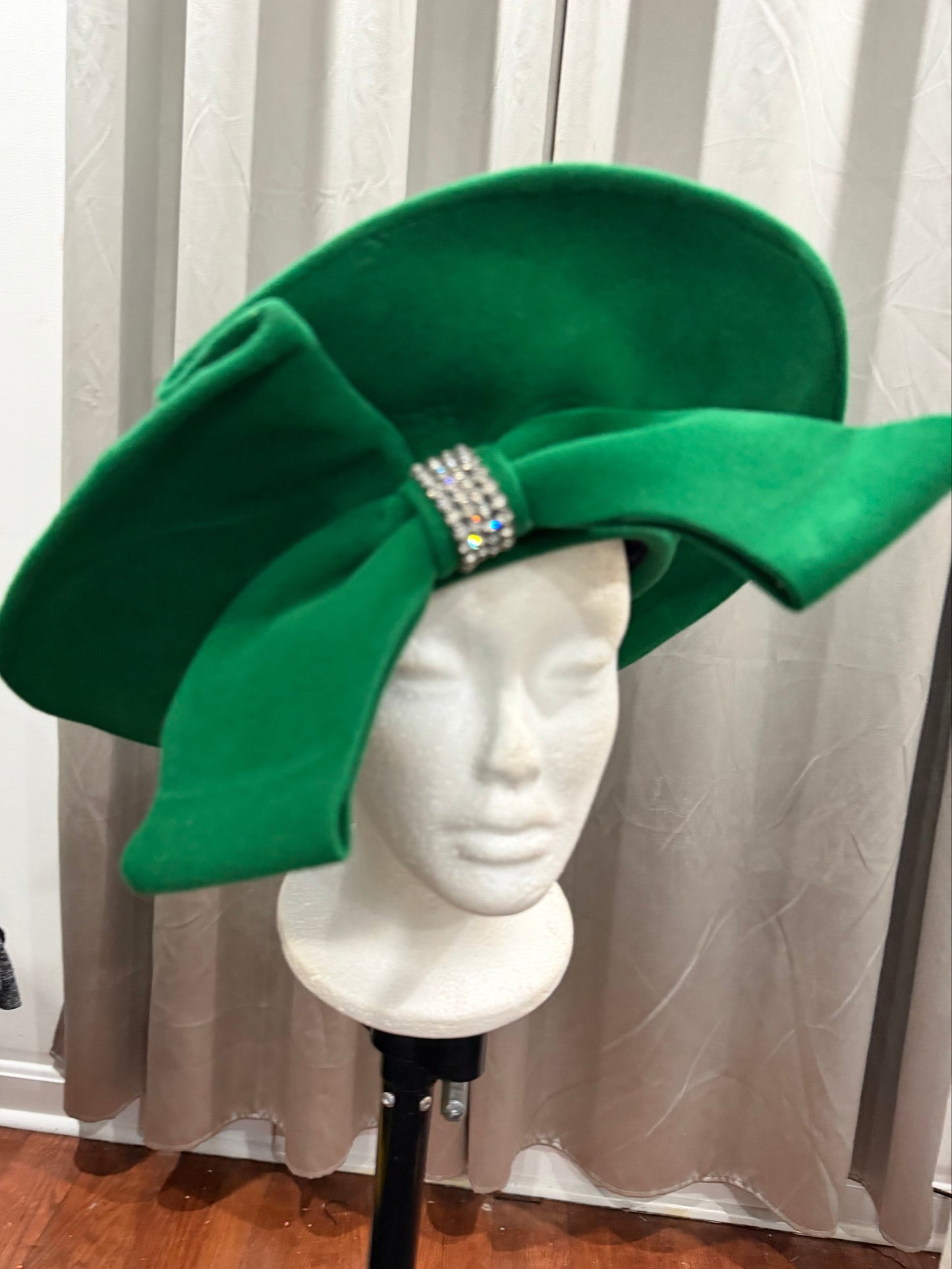 Green Hat with a Decorative Bow